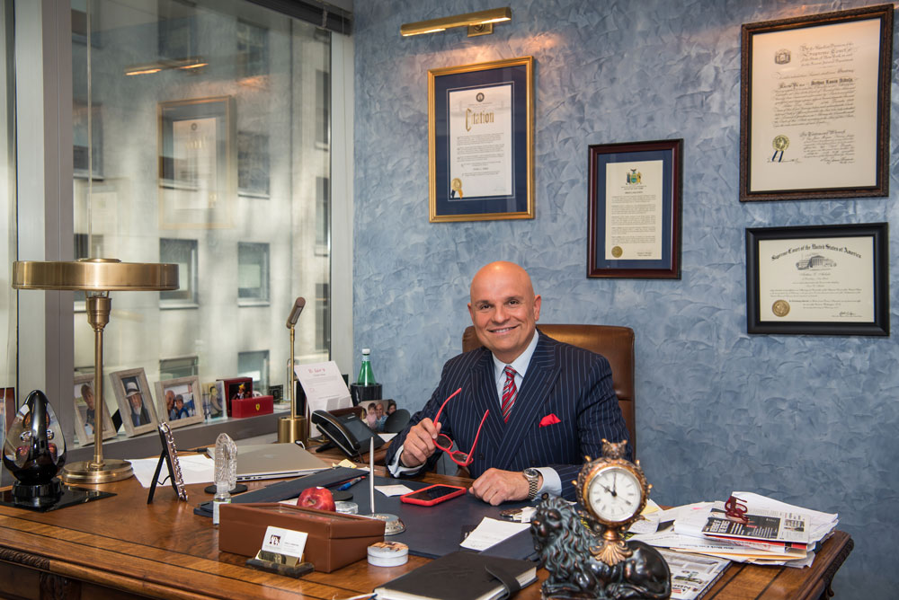 photo of Arthur Aidala at his desk